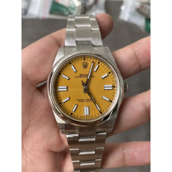 VS Factory Rolex Oyster Perpetual 41mm Yellow Dial Smooth Bezel Oyster Bracelet(124300) 1:1 Super Clone – DD3230 Movement